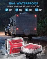 Two LED lights with a truck and camper in the rain with waterproof feature.